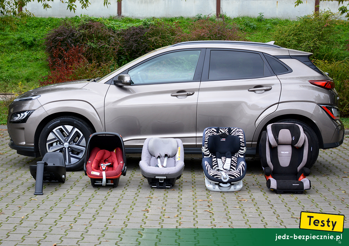 Testy - Hyundai Kona EV - próby z montażem fotelików samochodowych dla dzieci, pas bezpieczeństwa, Isofix, i-size, top-tether