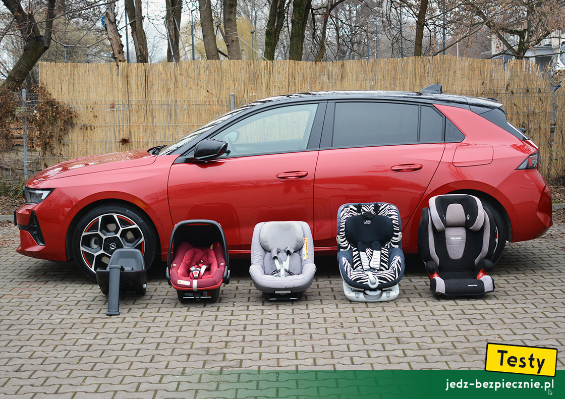 Testy - Opel Astra VI hatchback plug-in - próby z montażem fotelików samochodowych dla dzieci, pas bezpieczeństwa, Isofix, i-size, top-tether, tyłem, przodem, do kierunku jazdy