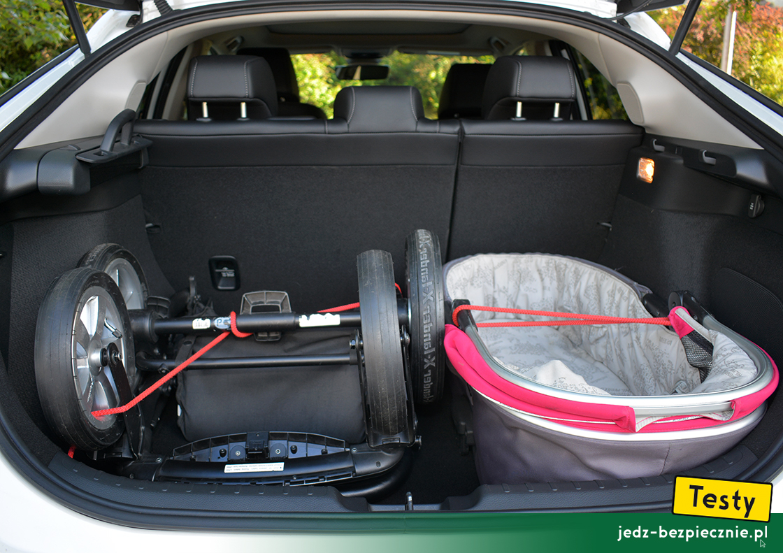 Testy - Honda Civic XI e:HEV - próba spakowania do bagażnika wózka dziecięcego X-lander, podwozie i gondola