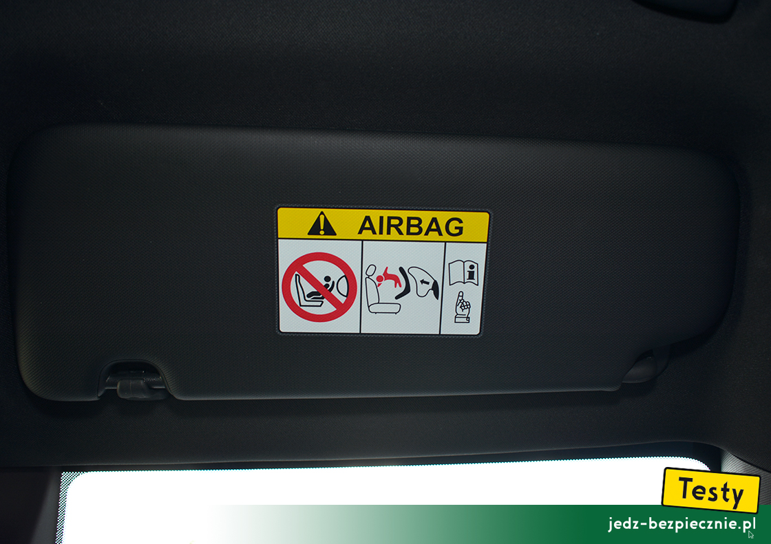 Testy - Kia Ceed III hatchback - ostrzeżenie na osłonie przeciwsłonecznej pasażera